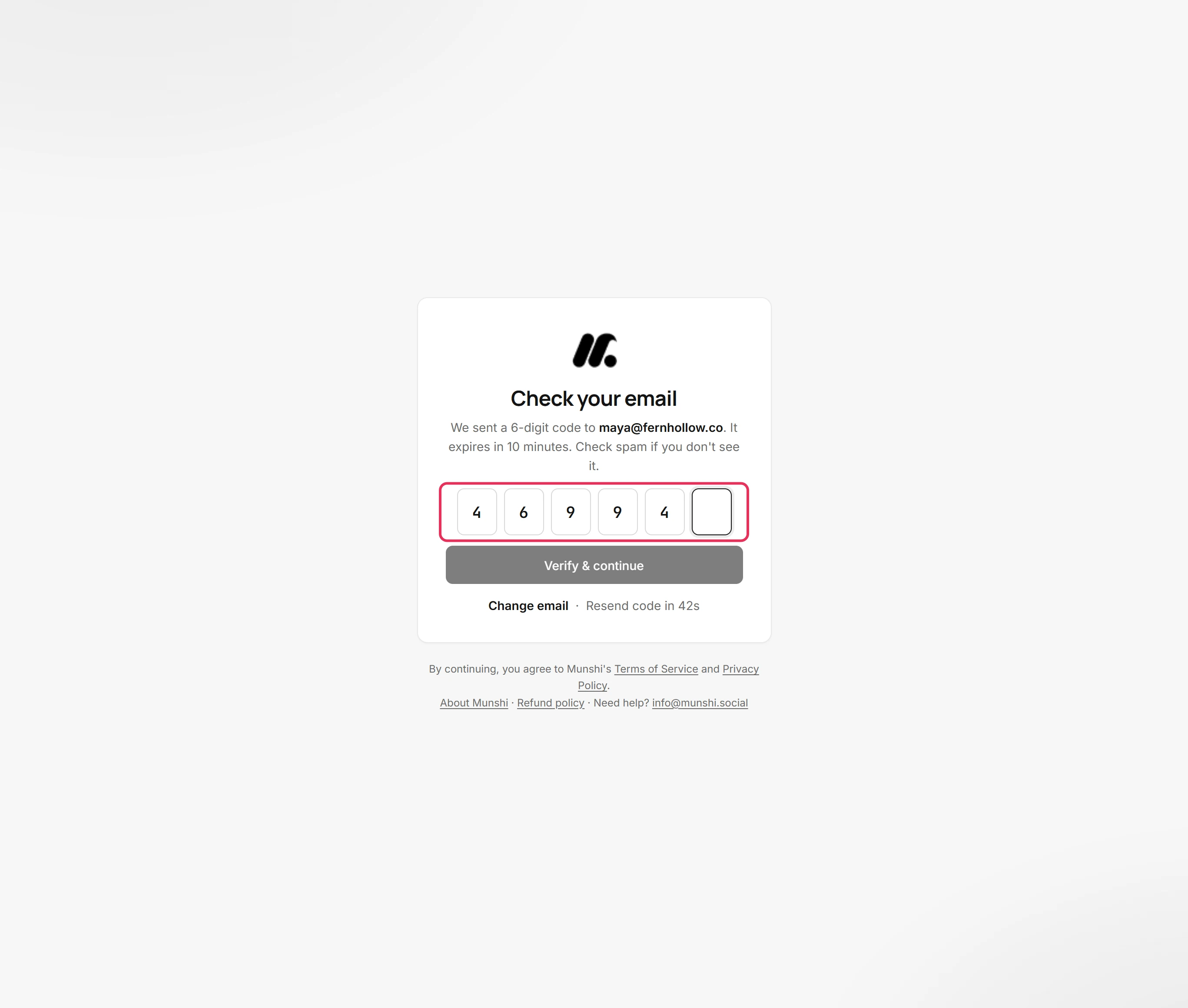 The six code boxes on the Check your email screen with the first five digits typed, outlined.